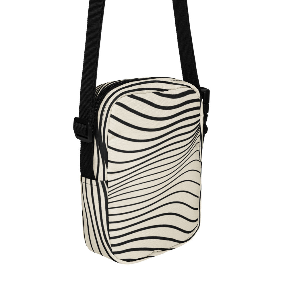 Swell Field Crossbody by KAIVRE, side. Edition number shown is an example.